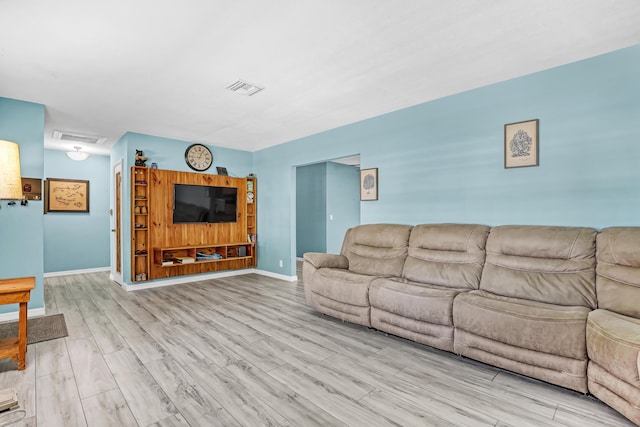 living room with light hardwood / wood-style floors