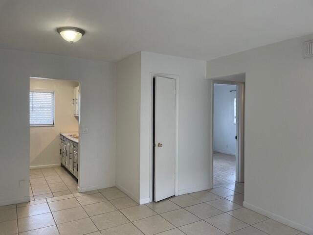 view of tiled spare room