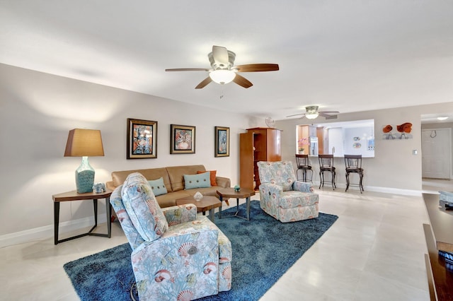 living room featuring ceiling fan