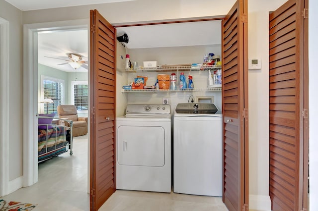 laundry area with ceiling fan and washing machine and clothes dryer