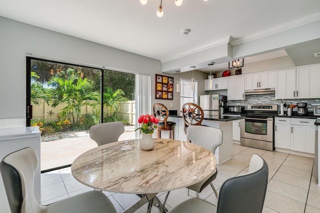 dining space with light tile patterned floors