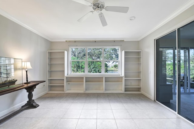 spare room with light tile patterned floors, ceiling fan, and ornamental molding