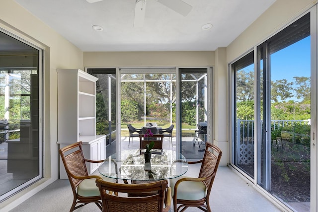 sunroom / solarium with ceiling fan