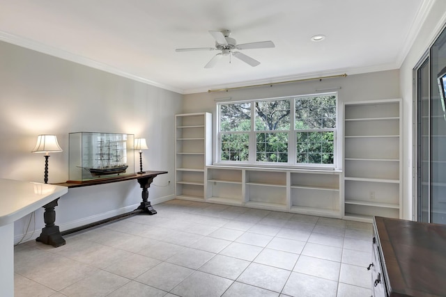 tiled home office featuring ceiling fan and ornamental molding