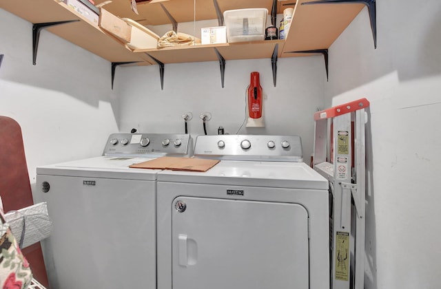 washroom featuring separate washer and dryer