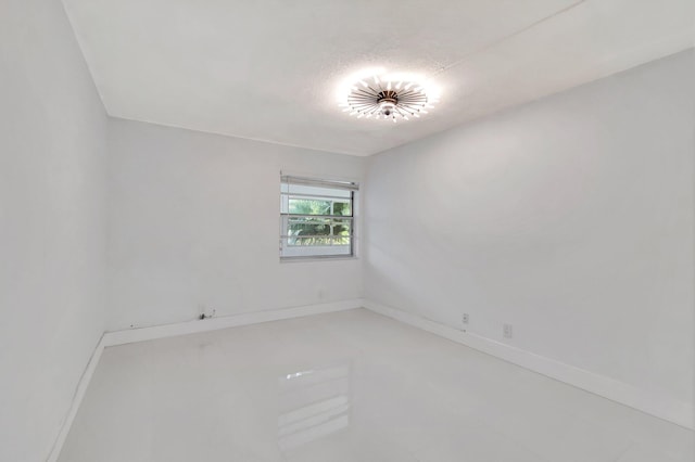 empty room with a textured ceiling