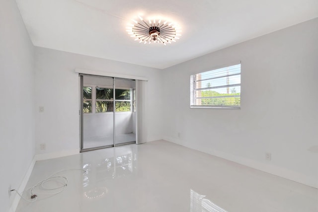 spare room featuring a wealth of natural light