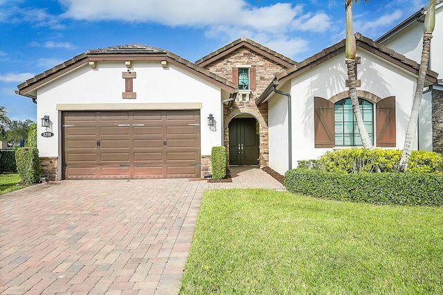 8259 Grand Prix Ln, Boynton Beach, FL 33472 - mediterranean / spanish home with a garage and a front lawn