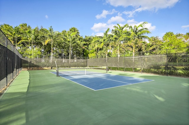 view of tennis court featuring basketball court