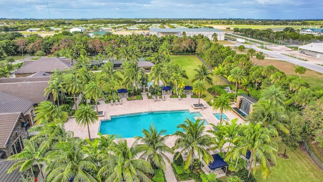 view of swimming pool featuring a patio area