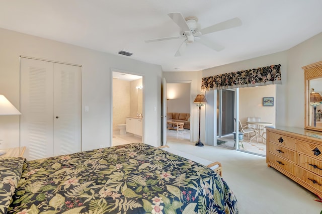 carpeted bedroom featuring access to exterior, ensuite bathroom, a closet, and ceiling fan