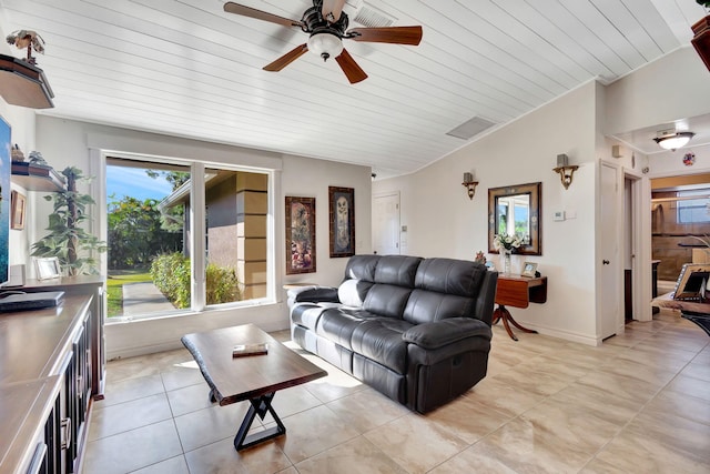 living room with wood ceiling, ceiling fan, lofted ceiling, and light tile patterned flooring