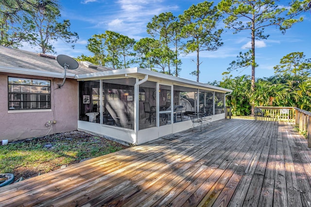 deck with a sunroom