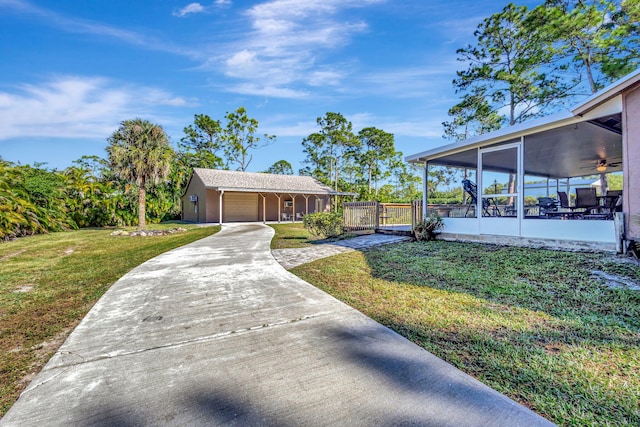 exterior space with a front yard and a sunroom