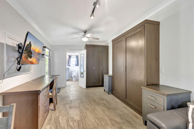 interior space featuring ceiling fan, crown molding, and track lighting