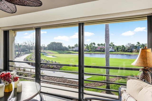 sunroom with a water view