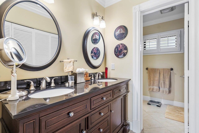 bathroom with tile patterned flooring, vanity, and ornamental molding