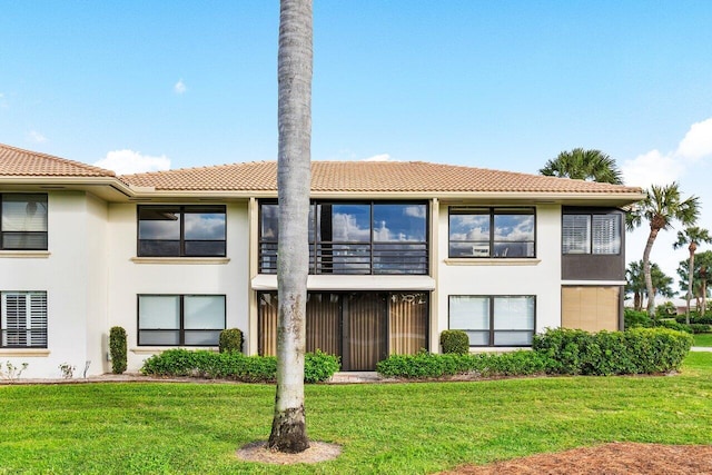 exterior space with a front lawn