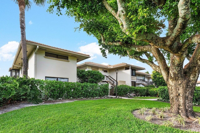 exterior space with a lawn