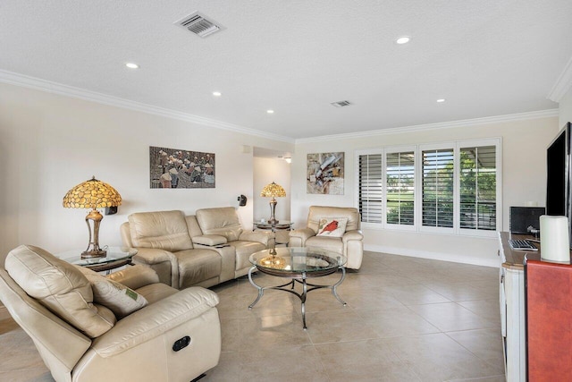 tiled living room featuring a textured ceiling and ornamental molding