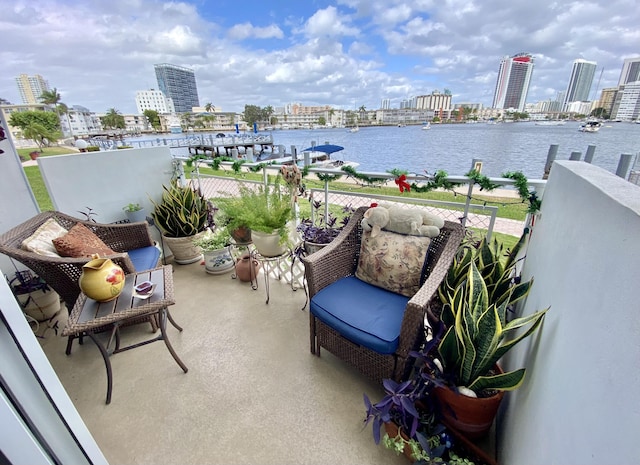 balcony featuring a water view