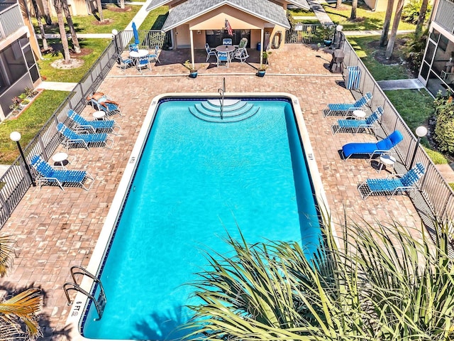 view of swimming pool with a patio area