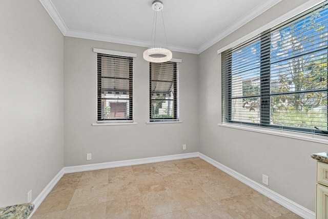 unfurnished room featuring ornamental molding