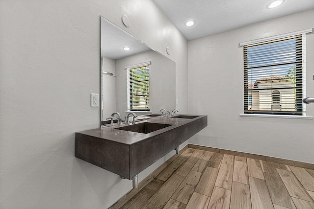 kitchen with wood-type flooring and sink