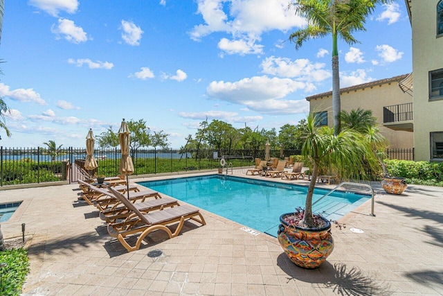 view of swimming pool featuring a patio