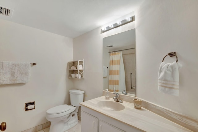 bathroom featuring tile patterned floors, vanity, a shower with shower curtain, and toilet