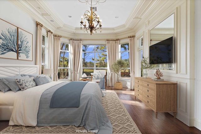 bedroom with ornamental molding, an inviting chandelier, and dark wood-type flooring