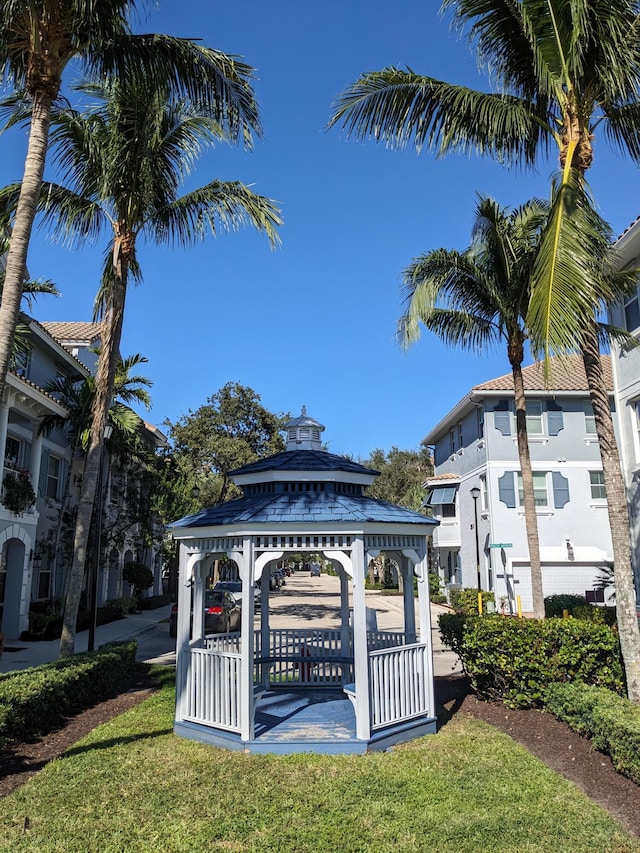 view of property's community featuring a gazebo and a lawn