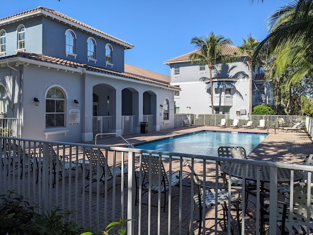 view of pool with a patio area