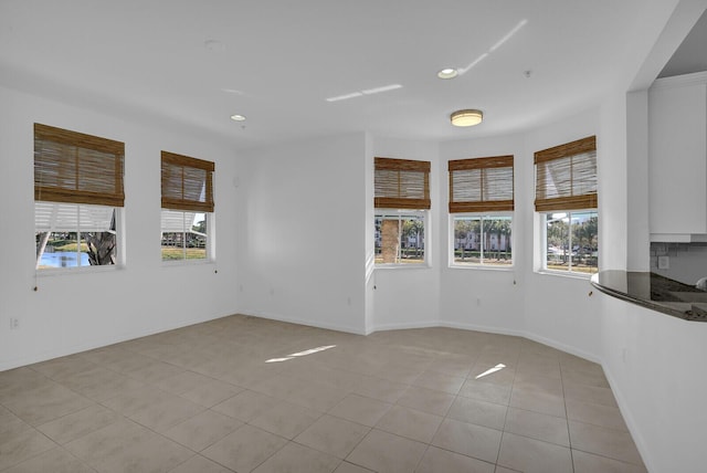 interior space with light tile patterned floors