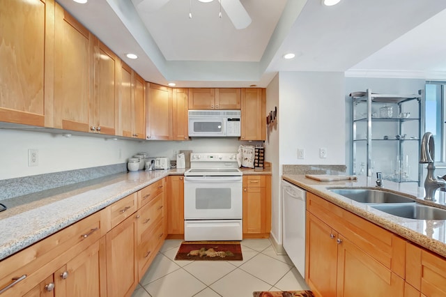 kitchen with ceiling fan, sink, light stone counters, white appliances, and light tile patterned floors