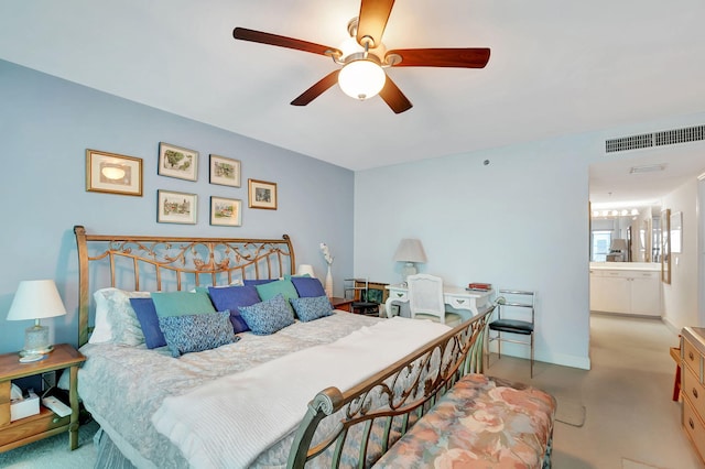 bedroom featuring connected bathroom and ceiling fan