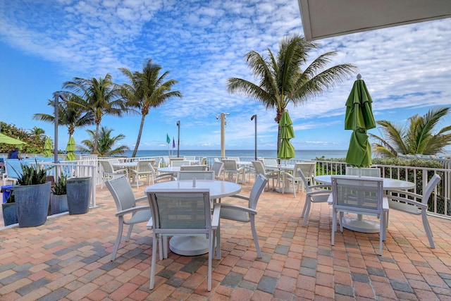 view of patio / terrace with a water view