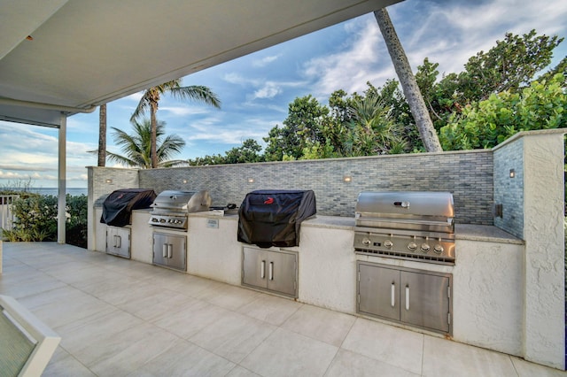 view of patio with a grill and exterior kitchen