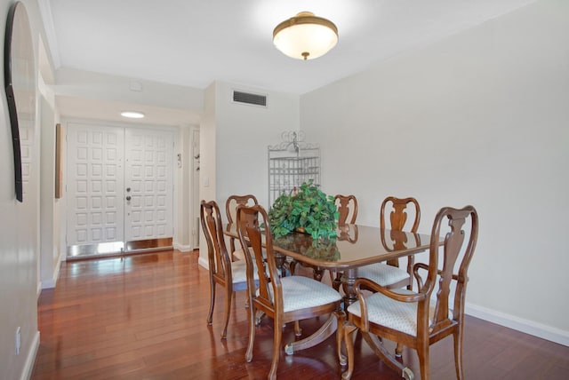 dining room featuring dark wood-type flooring