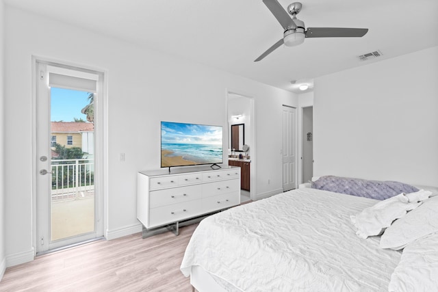 bedroom featuring ceiling fan, light hardwood / wood-style floors, and access to outside