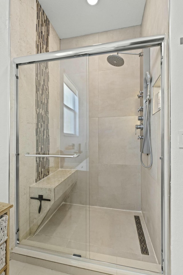 bathroom featuring an enclosed shower