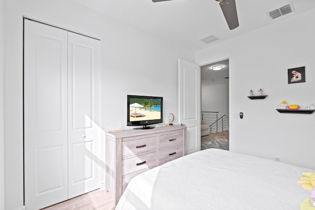 bedroom featuring a closet and ceiling fan