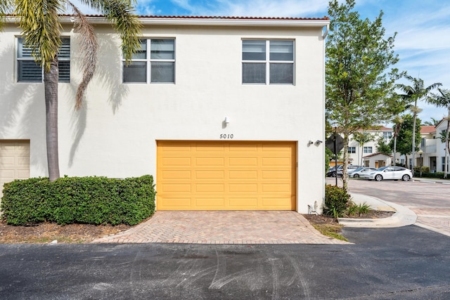 view of front of property featuring a garage