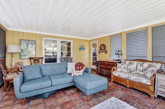 living room featuring crown molding