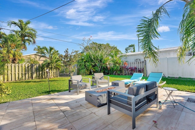 view of patio / terrace with a fire pit