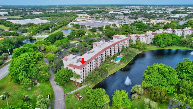 drone / aerial view with a water view