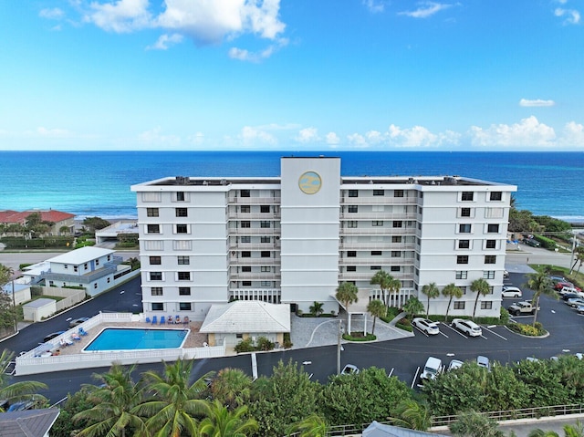 view of building exterior with a water view