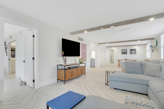 living room featuring ceiling fan, parquet flooring, and beamed ceiling