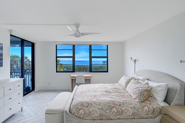 bedroom featuring ceiling fan, access to outside, and light parquet flooring