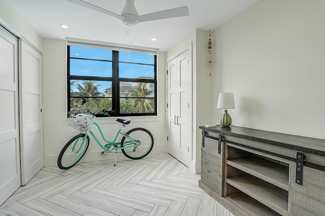 interior space featuring ceiling fan